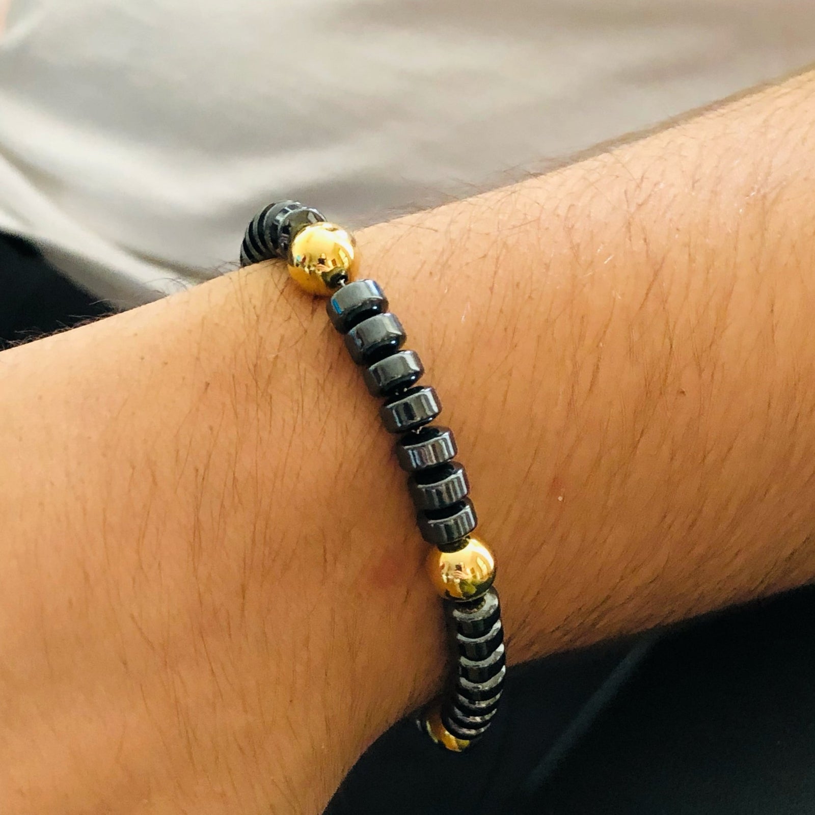 Byzylyk për meshkuj çelik i larë në flori modern