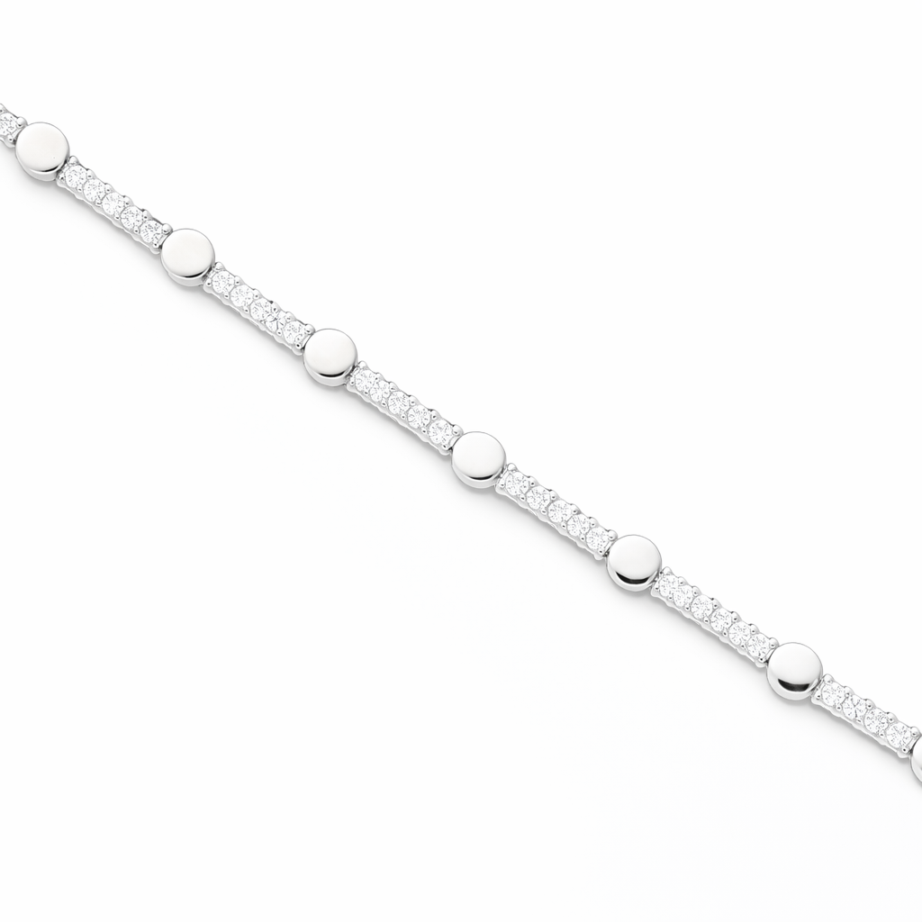 Detaj diagonal i byzylykut stil tenis ngjyre argjendi, me rreshta guresh te bardhe te ndare nga disqe te rrumbullaketa te lemuara | Penelope Jewellery