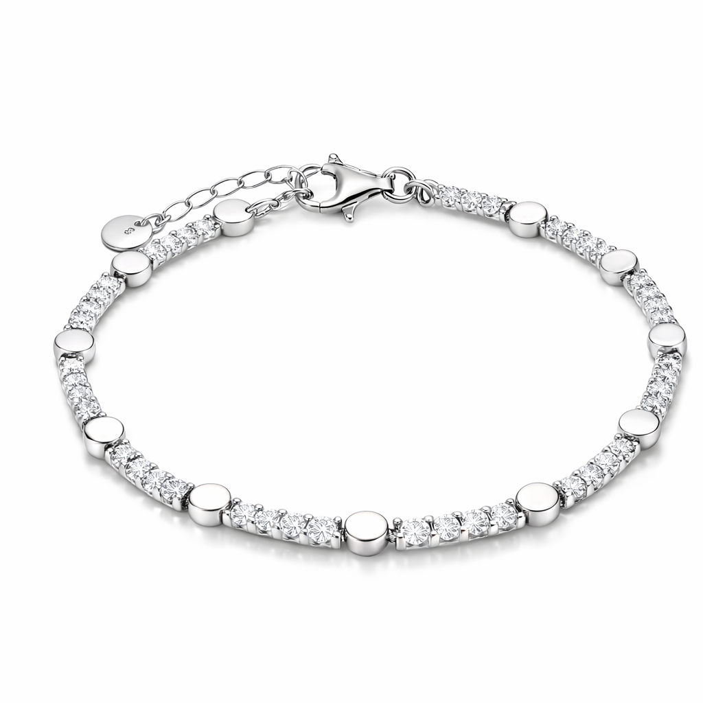 Byzylyk stil tenis ngjyre argjendi me gure te bardhe, disqe te rrumbullaketa, kapese dhe zinxhir zgjatues, pamje rrethore ne sfond te bardhe | Penelope Jewellery