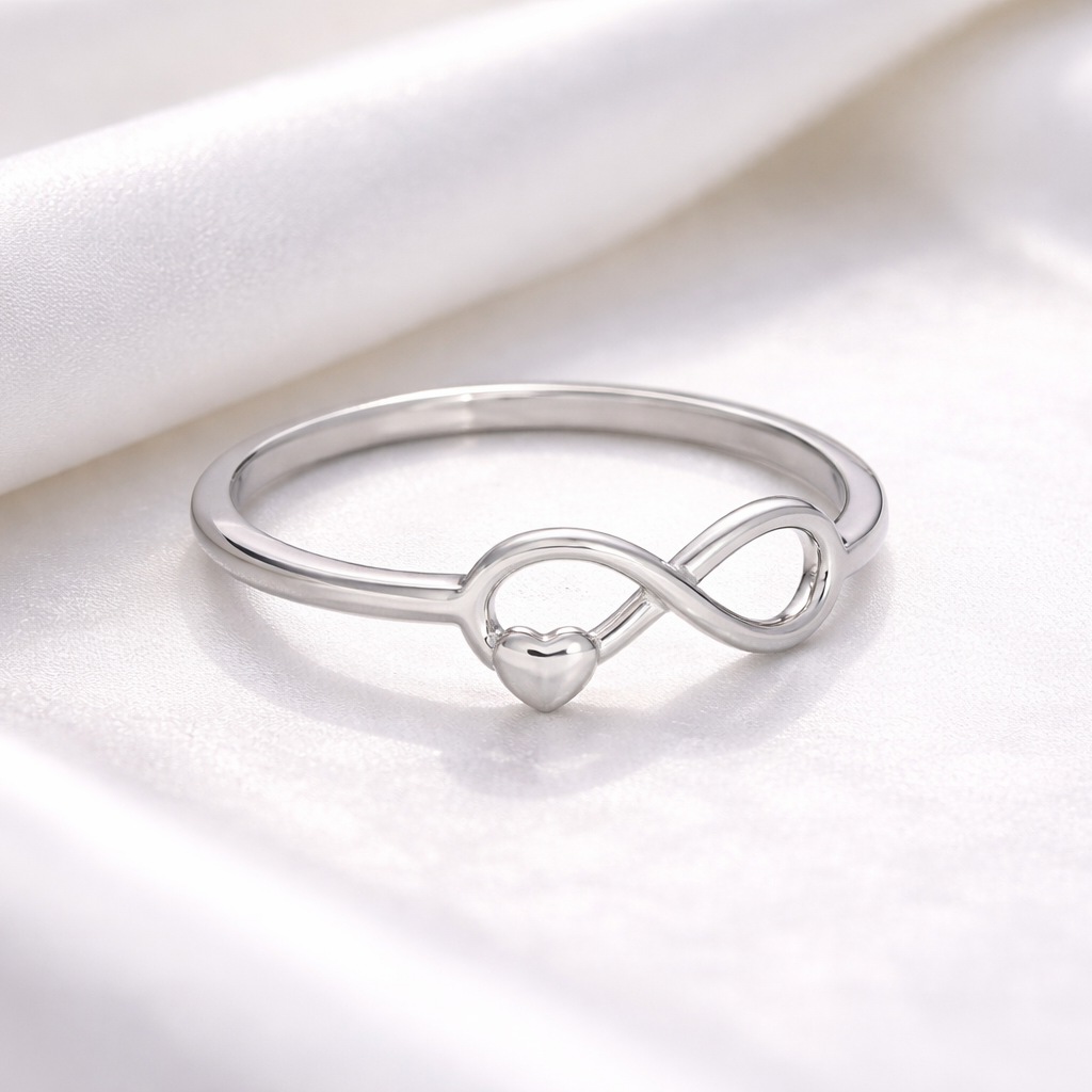 Unaze Infinity U4020 me simbol infiniti dhe zemer te vogel, e vendosur mbi saten te bardhe | Argjend 925 | Penelope Jewellery