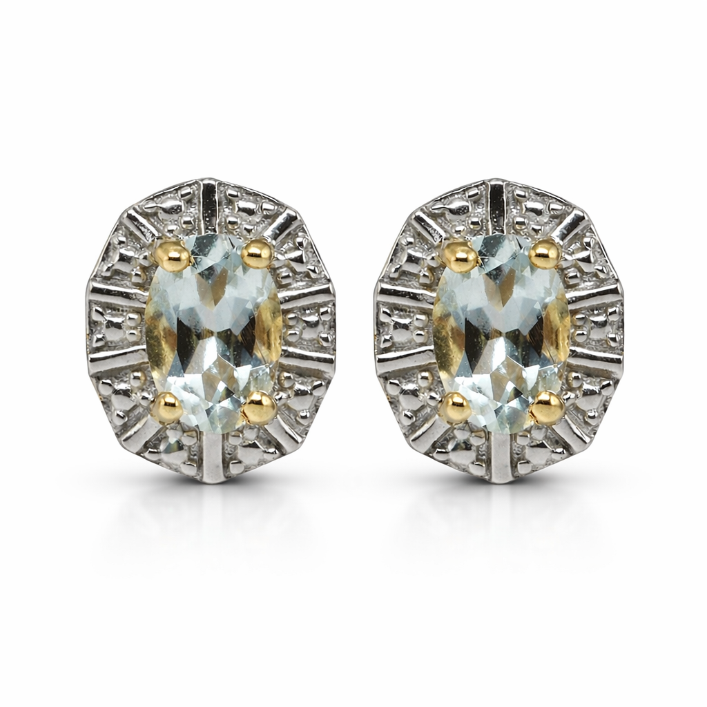 Cift vathesh Aqua Elegance V4841 prej argjendi, me akuamarin oval blu te celur dhe kornize me detaje te bardha, pamje ballore | Penelope Jewellery