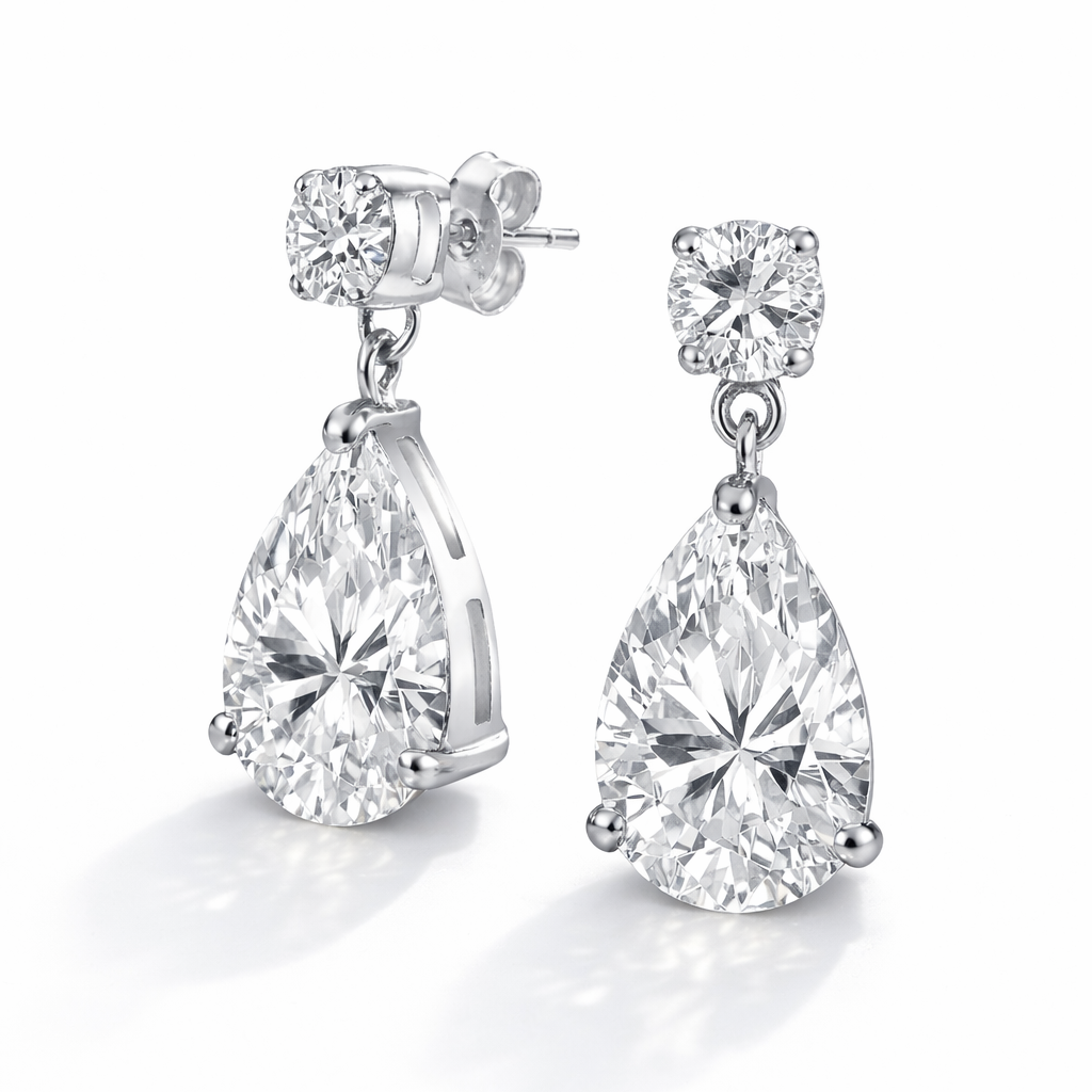 Vathe Iris me zirkone te bardhe ne forme dardhe dhe detaje rrethore siper, cift me kunj dhe kapese flutur te dukshme | Argjend 925 | Penelope Jewellery
