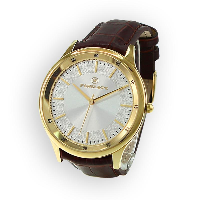 Gold wristwatch with textured silver dial and brown leather strap