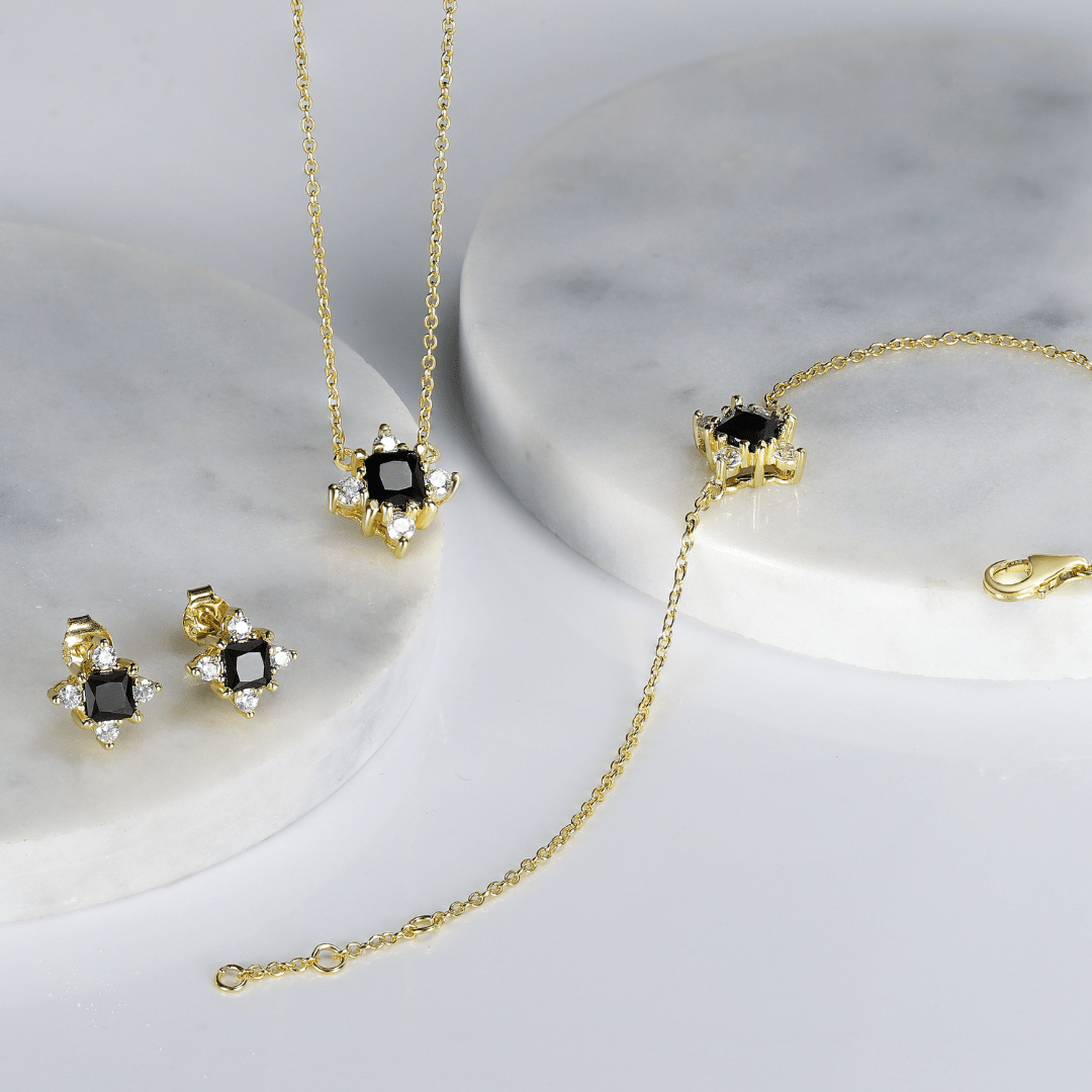 Set Nola me varëse dhe vathë me zirconia të zeza dhe të bardha në argjend 925 të larë në ar 18K nga Penelope Jewellery