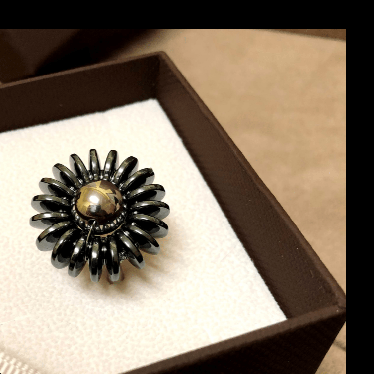 steel-daisy-ringsteel-daisy-ringunaza-7680528 - Penelope Jewellery